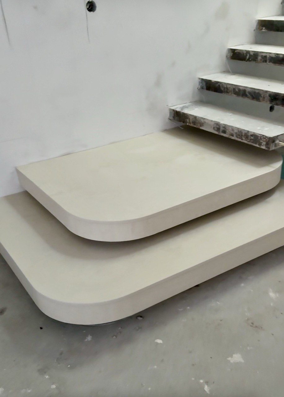 floating quartz stairs, modern minimalist staircase, luxury interior stairs, white stone steps, cantilever staircase design